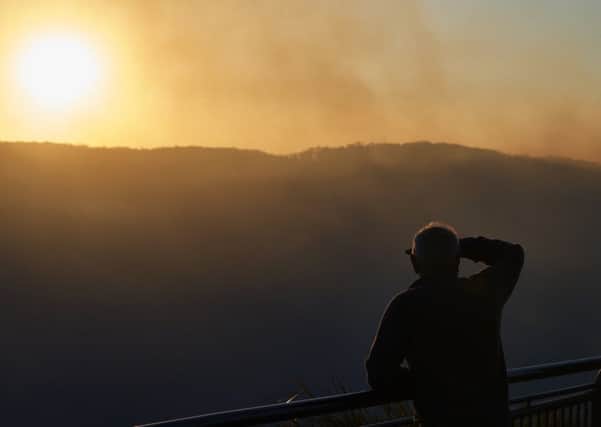 Smoke fills the sky near Katoomba, Australia. It is estimated that 20 per cent of the Blue Mountains World Heritage Area has been affected by bushfires. (Picture: Brett Hemmings/Getty Images)