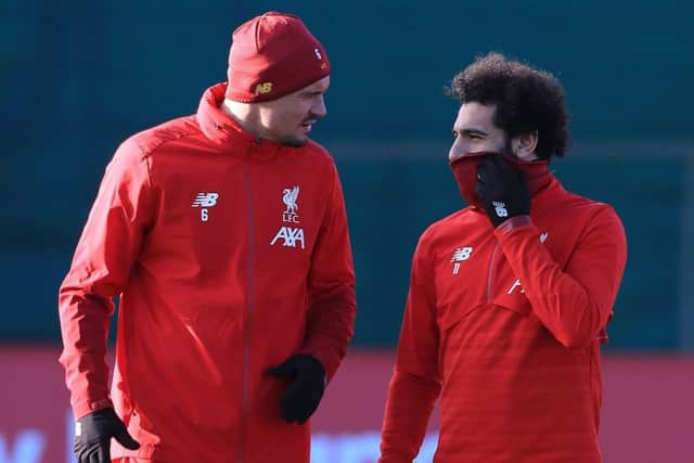 Dejan Lovren, left, and Mohamed Salah train at Melwood ahead of Liverpool's clash with RB Salzburg.  Picture: PA