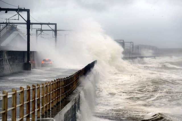 Heavy rain and high winds will strike Scotland today. Picture: John Devlin