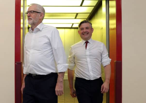 Labour Party leader Jeremy Corbyn (left) and shadow health secretary Jonathan Ashworth during a visit to Crawley Hospital in West Sussex. Picture: Andrew Matthews/PA Wire