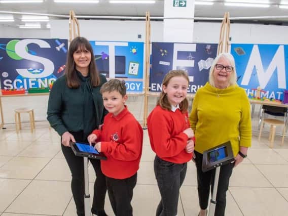 From left: Jill Glennie with Ain Gibson and Grace Milne - P6 pupils from Whitehills School - and Liz Hodge from Aberdeen Science Centre.Picture: Contributed