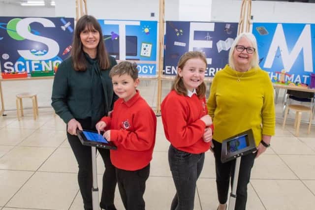 From left: Jill Glennie with Ain Gibson and Grace Milne - P6 pupils from Whitehills School - and Liz Hodge from Aberdeen Science Centre.Picture: Contributed