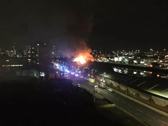 Eyewitnesses reported flames shooting from the roof of the three-storey building near Lancefield Quay. Picture: Giggles Glittermallow