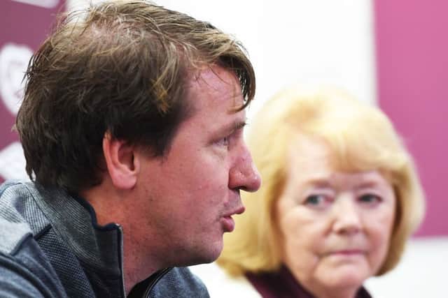 Daniel Stendel meets the press as Ann Budge looks on