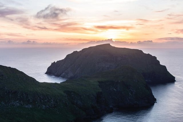 To the north west of Hirta lies Gleann Mhor, which is littered with beehive cells which may have provided shelter from the 4th Century. The island of Soay, home only to a rare breed of feral sheep, is also seen.