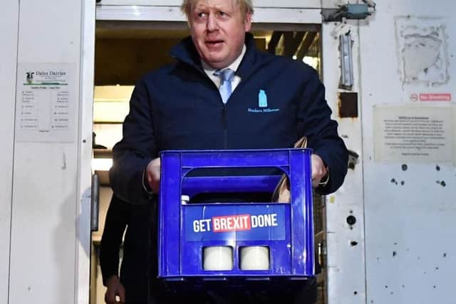 Boris Johnson retreated into a walk-in fridge at the Modern Milkman dairy to avoid further questions from journalists. Picture: PA