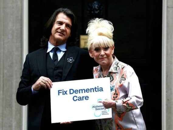 Dame Barbara Windsor with her husband Scott Mitchell on the steps of Downing Street in September. Picture: SWNS
