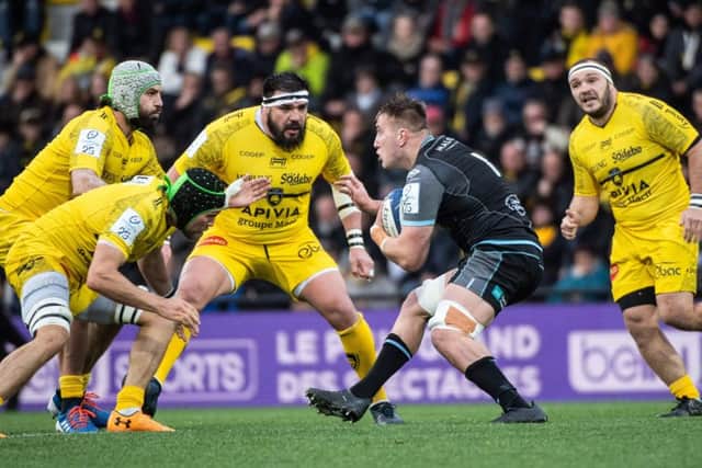 Matt Fagerson takes on the La Rochelle defence during Glasgow's Champions Cup win in France. Picture: Xavier Leoty/AFP via Getty