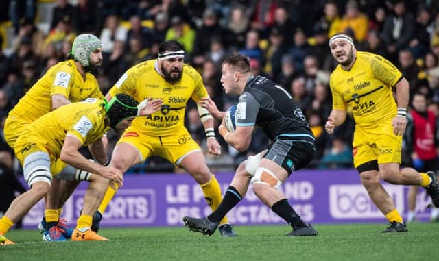 Matt Fagerson takes on the La Rochelle defence during Glasgow's Champions Cup win in France. Picture: Xavier Leoty/AFP via Getty