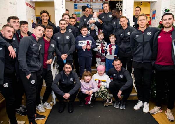 Sean Clare and the rest of the Hearts squad visited young patients at Edinburghs Royal Hospital for Sick Children. Picture: Ross Parker/SNS