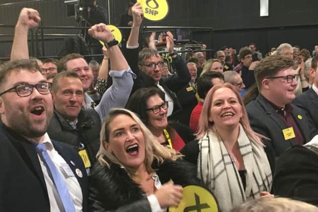 SNP supporters in Gordon hear that Richard Thomson has won the seat back for the party.