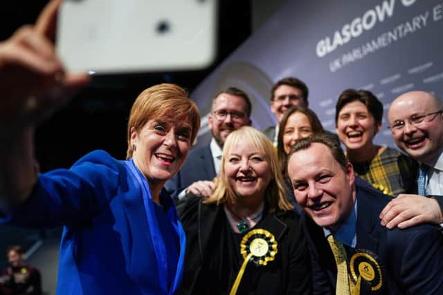 Nicola Sturgeon celebrates with her party. Picture: PA
