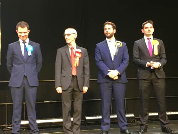 Conservative Andrew Bowie smiles as he hears the final result, with the Tory beating SNP candidate Fergus Mutch (second right) by 843 votes. Liberal Democrat John Waddell (far right) polled third with Labour's Paddy Coffield (second left) coming fourth.