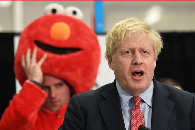 Lined up alongside the the victorious Johnson and his more traditional political foes on the stage of his west London constituency was a man dressed as a furry red Sesame Street character who called himself Bobby Elmo Smith.