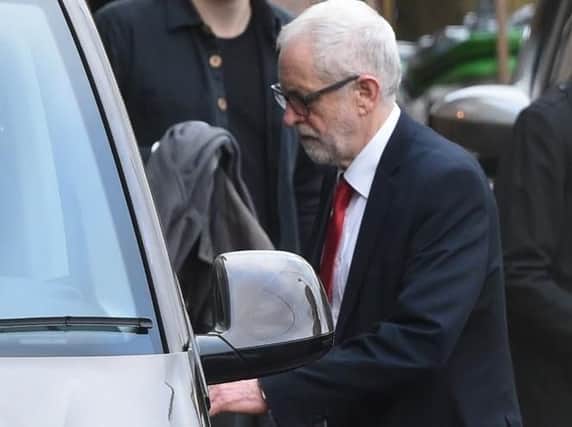 Jeremy Corbyn leaves Islington Town Hall after giving an interview following Labour's election defeat