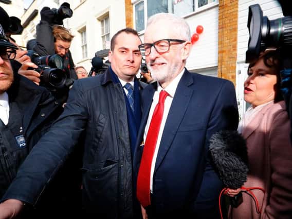 Jeremy Corbyn leaves his home in north London after Labour's defeat in the general election was revealed (Picture: Tolga Akmen/AFP/Getty)