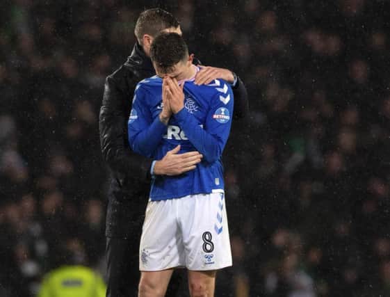Steven Gerrard comforts Ryan Jack as the tears flow after a Betfred Cup defeat that seemed to merit such an instinctive response. Photograph: Alan Harvey SNS