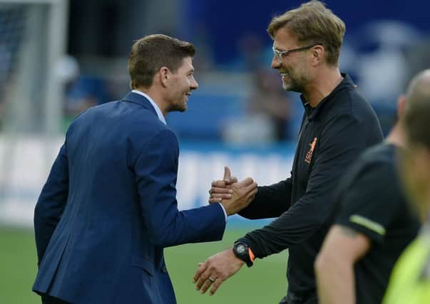 Rangers and Liverpool announced contract extensions for Steven Gerrard and Jurgen Klopp within little more than an hour of each other. Picture: Andrew Powell/Liverpool FC via Getty Images
