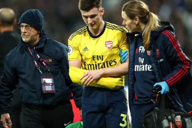 Kieran Tierney dislocated his shoulder playing for Arsenal against West Ham. Picture: Getty Images
