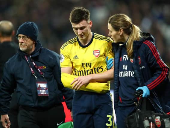 Kieran Tierney dislocated his shoulder playing for Arsenal against West Ham. Picture: Getty Images