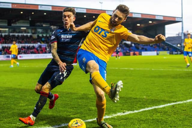 Kilmarnock's Stephen O'Donnell jostles with Josh Mullin of Ross County. Picture: Bruce White / SNS