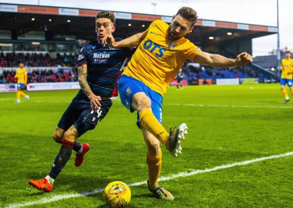 Kilmarnock's Stephen O'Donnell jostles with Josh Mullin of Ross County. Picture: Bruce White / SNS