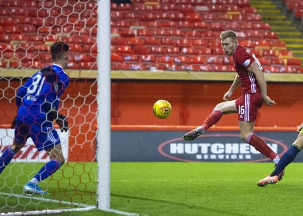 Sam Cosgrove opens the scoring for Aberdeen against Hamilton. Picture: Ross MacDonald / SNS