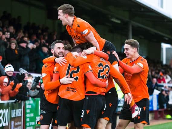 Dundee United players celebrate Sam Stanton's goal. Picture: SNS