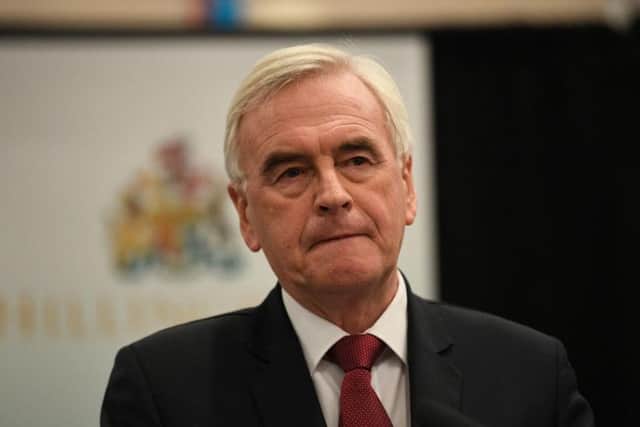 The shadow chancellor said "if anyone's to blame, it's me, full stop", but also cited Brexit and the media for having "demonised" the Labour leader ahead of the dismal defeat.
