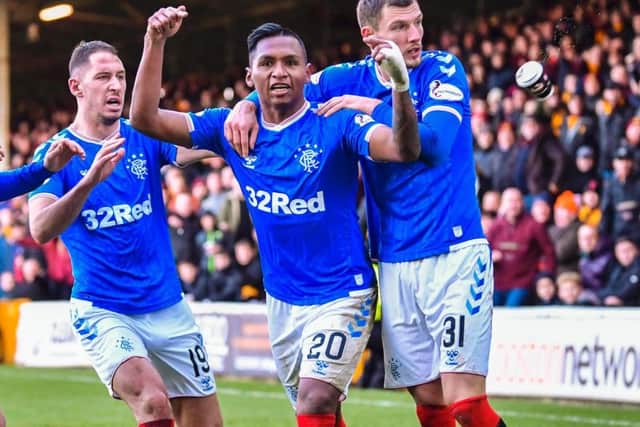 A cup of Bovril is thrown at Rangers' Alfredo Morelos as he celebrates scoring