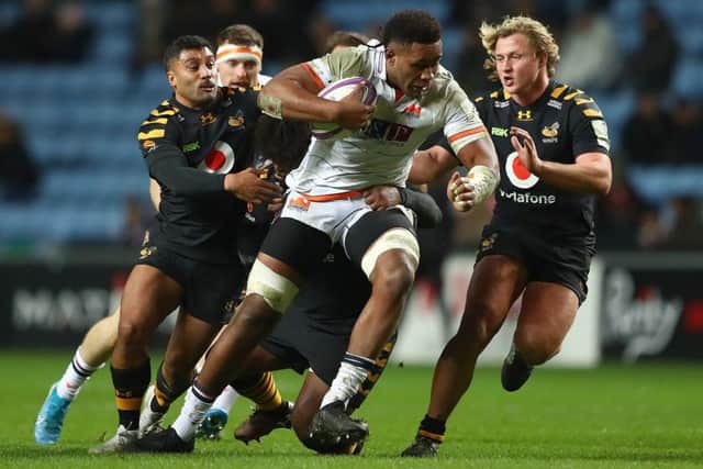 Viliame Mata of Edinburgh looks to break through the Wasps defence during the European Rugby Challenge Cup clash at the Ricoh Arena. Picture: Matthew Lewis/Getty Images