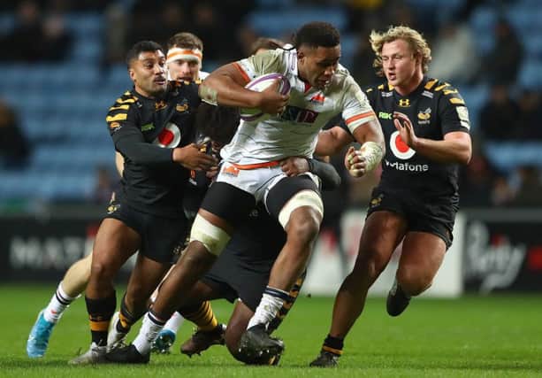 Viliame Mata of Edinburgh looks to break through the Wasps defence during the European Rugby Challenge Cup clash at the Ricoh Arena. Picture: Matthew Lewis/Getty Images