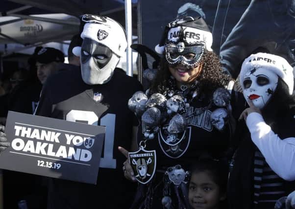 Raiders fans say goodbye to their home stadium. Picture: AP
