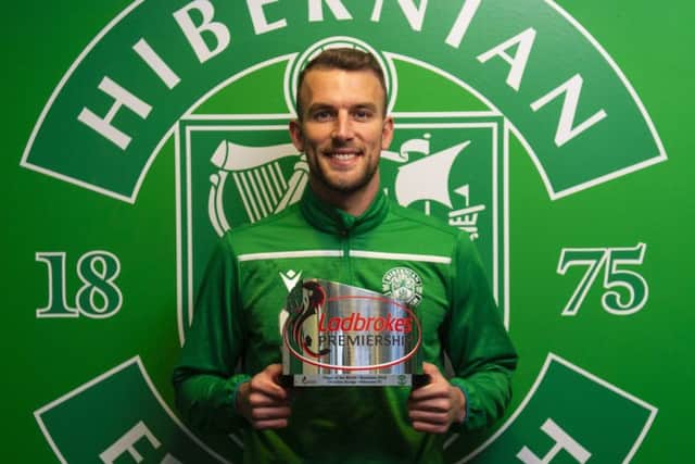 Christian Doidge shows off the Player of the Month award. Picture: SNS Group