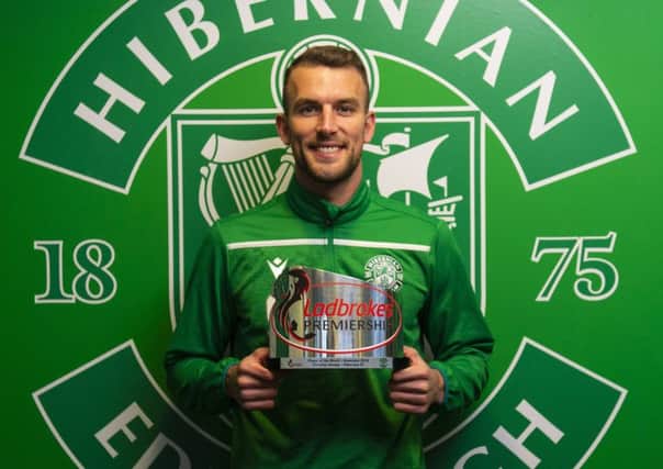 Christian Doidge shows off the Player of the Month award. Picture: SNS Group