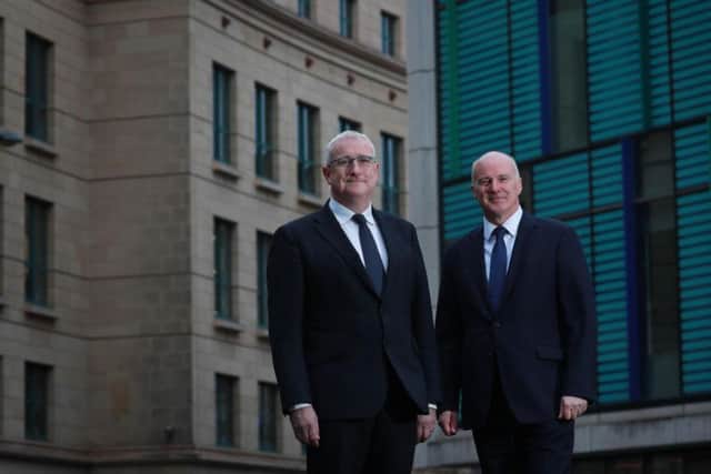 John Brett (left) and Graham Clark of Anderson Strathern Asset Management. Picture: Stewart Attwood.