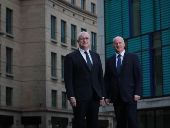 John Brett (left) and Graham Clark of Anderson Strathern Asset Management. Picture: Stewart Attwood.