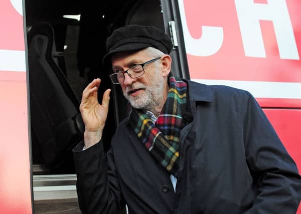 Jeremy Corbyn leaves the Labour 'battle bus' in Linlithgow (Picture: Michael Gillen)