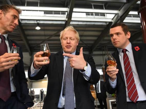 Douglas Ross (right) with Boris Johnson during the general election campaign