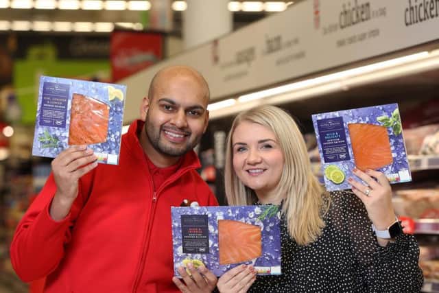 Luqmaan Ali, Asda Fraserburghs general store manager, and Isla Smillie of Youngs Seafood. Picture: Simon Price.