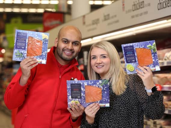 Luqmaan Ali, Asda Fraserburghs general store manager, and Isla Smillie of Youngs Seafood. Picture: Simon Price.