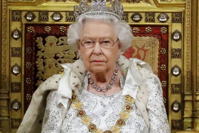 Queen Elizabeth II delivers the Queen's Speech during the State Opening of Parliament in the House of Lords at the Palace of Westminster in London. Picture: Tolga Akmen/PA Wire
