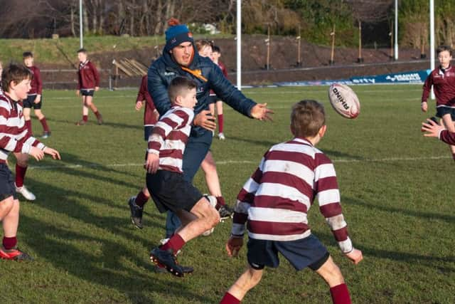 McInally visited his old school, George Watson's College, ahead of the weekend's clash