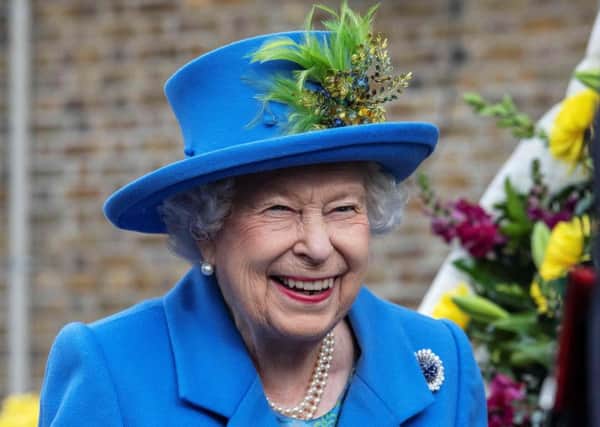 Queen Elizabeth smiles during a vist to the Haig Housing Trust in Morden, southwest London to open new housing for veterans (Picture: Jack Hill/pool/AFP via Getty Images)