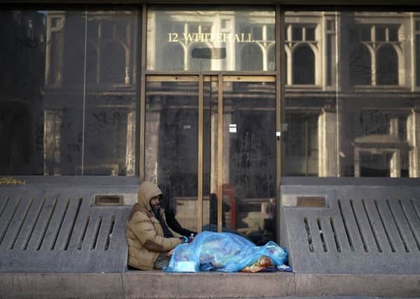 A homeless man on a street in central London after one of the coldest nights so far this winter (Picture: Christopher Furlong/Getty Images)