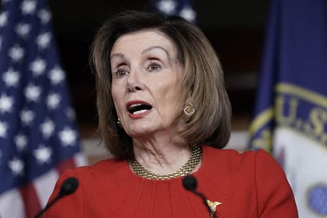 Nancy Pelosi has said that people have a "spring in their step" after the US House of Representatives impeached President Donald Trump.