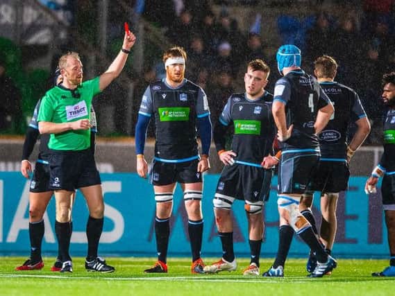 Matt Fagerson, second from left, is shown a red card by Wayne Barnes in the closing seconds of Saturday's Heineken Champions Cup clash with La Rochelle at Scotstoun. Picture: SRU/SNS