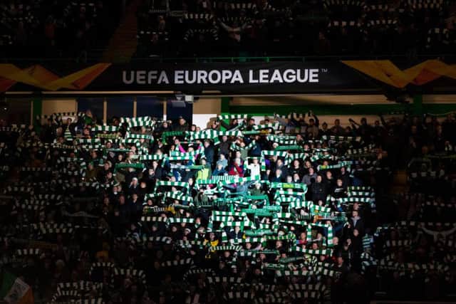Celtic fans attend a Europa League clash at Celtic Park
