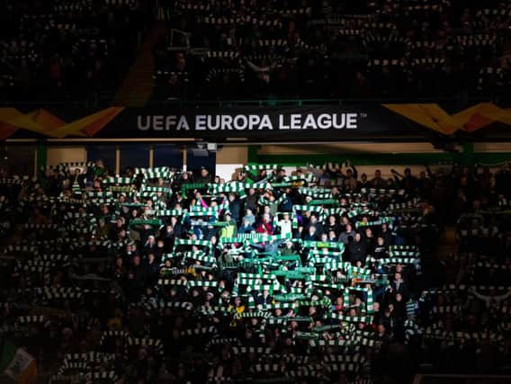 Celtic fans attend a Europa League clash at Celtic Park