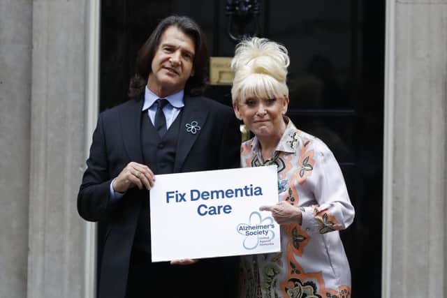 Prominent Alzheimer's sufferer Barbara Windsor and husband Scott Mitchell deliver a petition to No 10 Downing St. Picture: Tolga Akmen/Getty